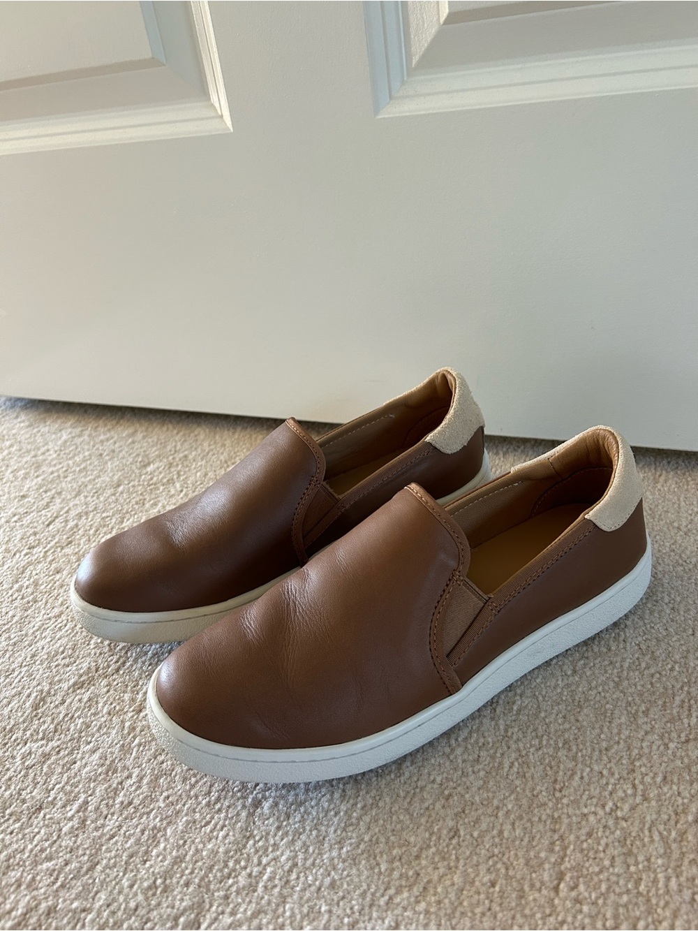 UGG Women's Brown Slip-On Loafers with Cream Heel Accent